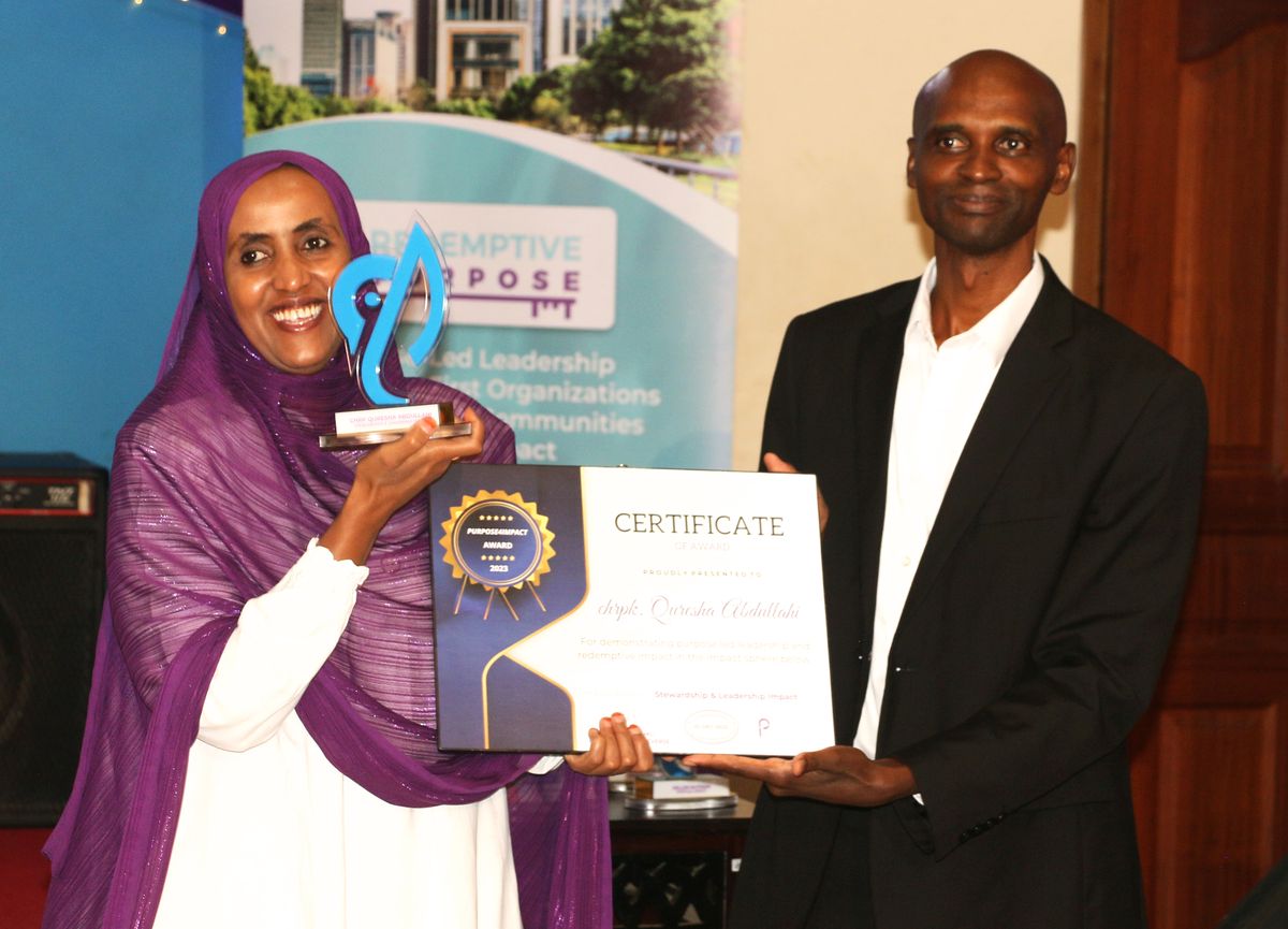 An award recipient receiving her certificate at the 2023 gala