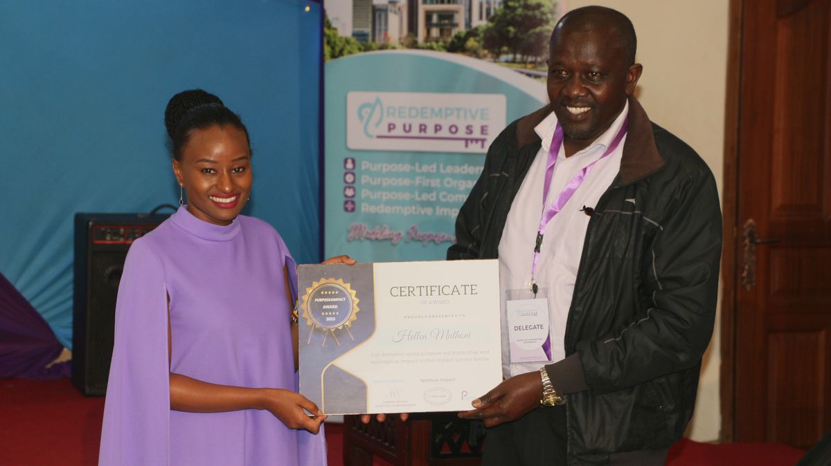 An award recipient receiving her certificate at the 2023 gala