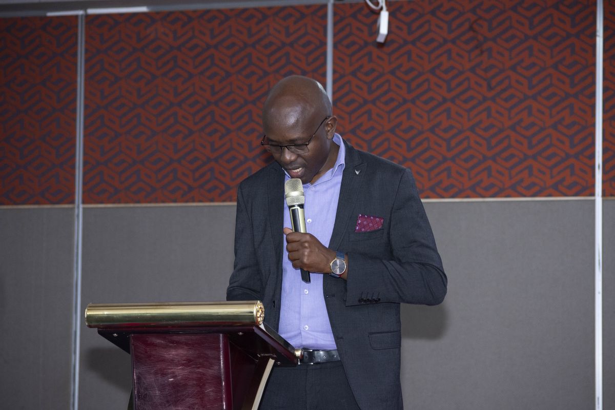 A speaker addressing PurposeFest 2024 from the lectern